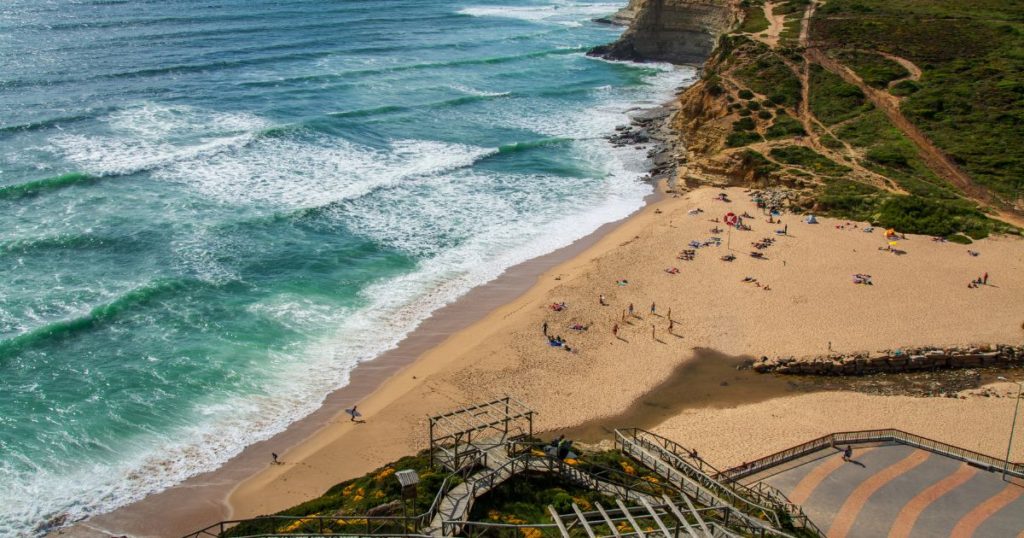 View of Praia de Ribeira - a stunning beach in Ericeira, Portugal.